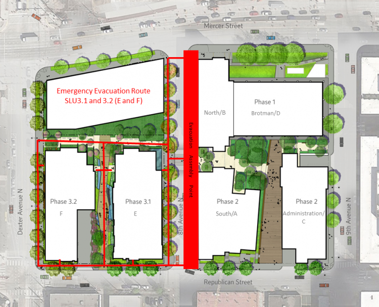 A simple emergency evacuation route map that indicates people should exit the building and gather on 8th Avenue N in a makeshift evacuation assembly point